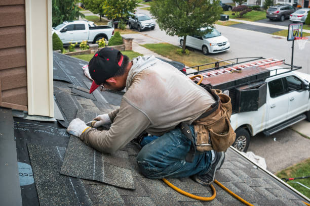 Professional Roofing technician working in Alcove, NY